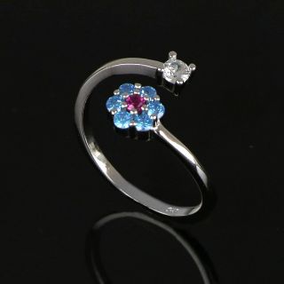 Ασημένιο δαχτυλίδι με λευκό ζιργκόν και λουλουδάκι με γαλάζια και κόκκινο ζιργκόν - 