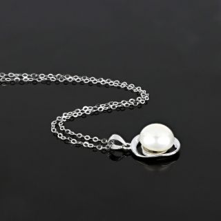 925 Sterling Silver rhodium plated necklace with a white fresh water pearl in the center 23x14 mm - 