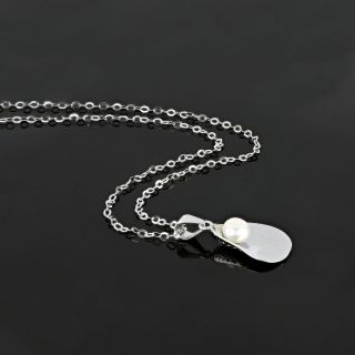 925 Sterling Silver rhodium plated necklace with a white fresh water pearl 23x12 mm - 