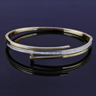 Bangles made of stainless steel in gold color"nail" design - 