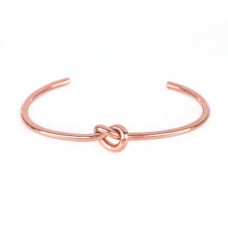 Stainless steel rose gold plated bangle with a knot