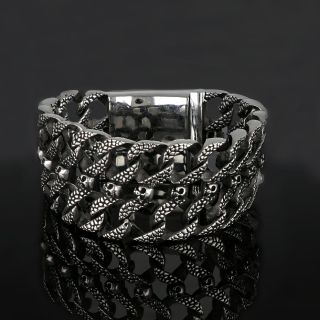 Men's stainless steel embossed bracelet with two rows and skulls - 