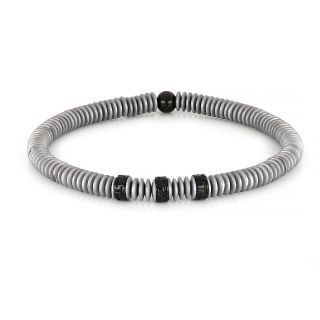 Bracelet made of semi precious stones with grey hematite and three stainless steel black meanders 