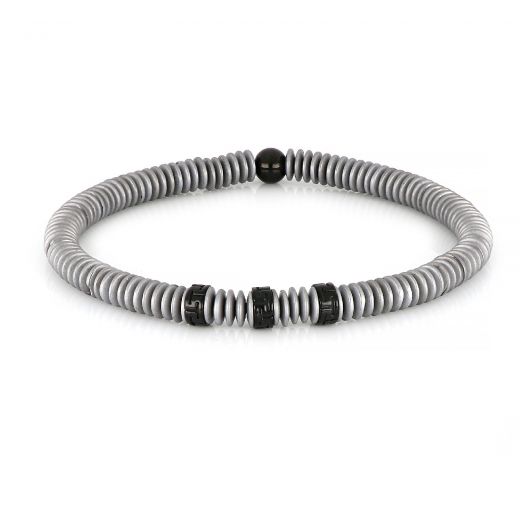 Bracelet made of semi precious stones with grey hematite and three stainless steel black meanders