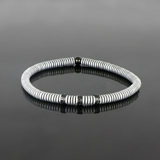 Bracelet made of semi precious stones with grey hematite and three stainless steel black meanders - 