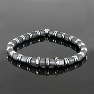 Bracelet made of semi precious stones with grey hematite in cubes, silver-colored hematite and three stainless steel meanders - 