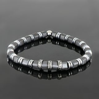 Bracelet made of semi precious stones with grey hematite in cubes, silver-colored hematite and three stainless steel meanders - 