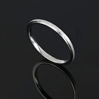 Stainless steel textured wedding ring - 
