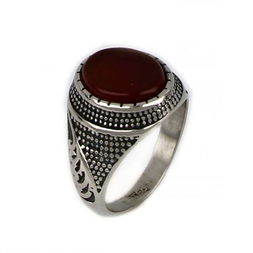 Ring made of stainless steel with embossed design and carnelian stone.