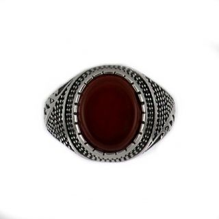 Ring made of stainless steel with embossed design and carnelian stone. - 