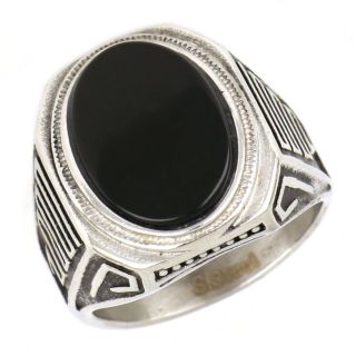Ring made of stainless steel with embossed meander design and black stone. - 