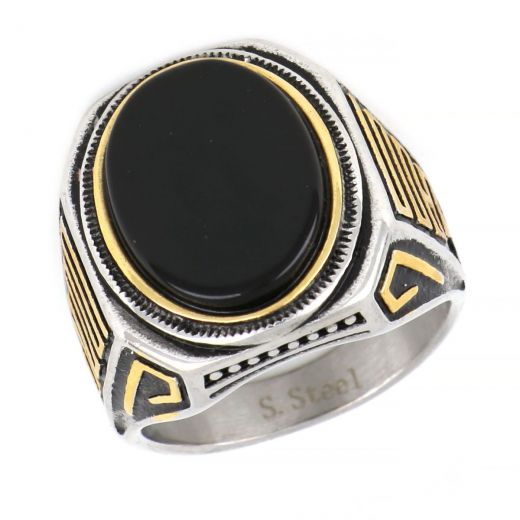 Ring made of stainless steel with gold plated meander and black stone.