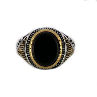 Ring made of stainless steel with gold plated embossed design and black stone. - 