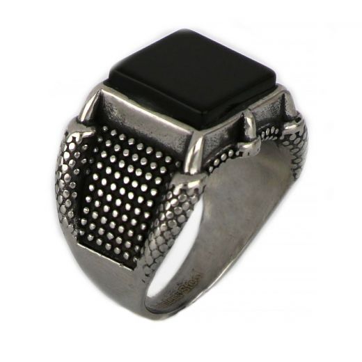 Ring made of stainless steel with embossed design and one big black stone.