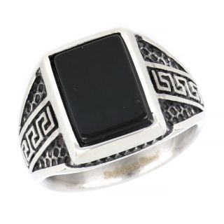 Ring made of stainless steel with embossed meander to the sides and black stone. - 