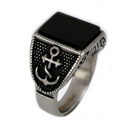 Ring made of stainless steel with embossed anchor design to the sides and black stone.