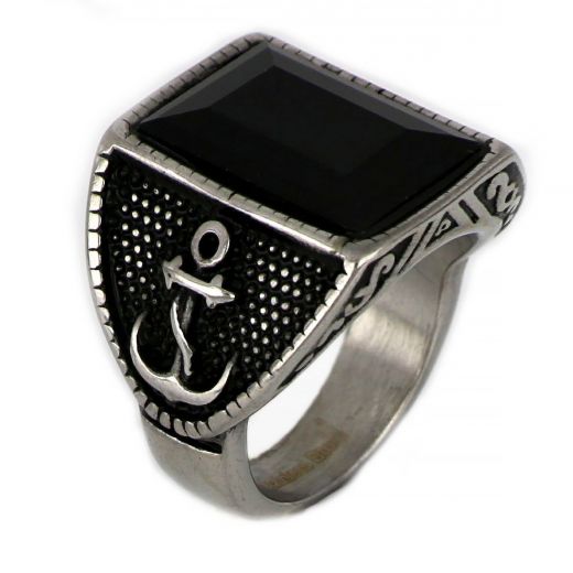 Ring made of stainless steel with two anchors to the sides and black stone.