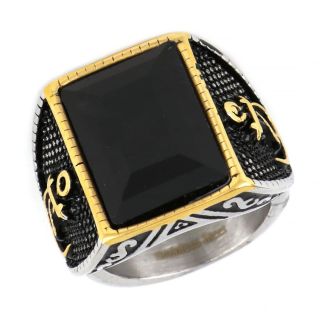 Ring made of stainless steel with two gold plated anchors to the sides and black stone. - 