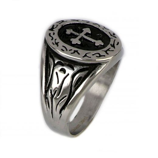 Ring made of stainless steel with embossed cross.