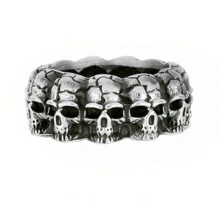 Ring made of stainless steel with a line of skulls. - 