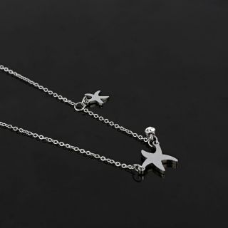 Necklace made of stainless steel with two starfishes and white strass. - 