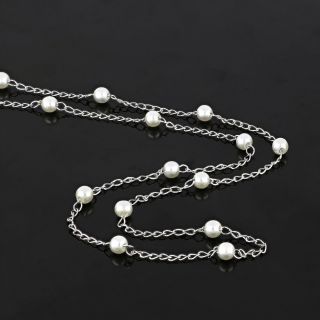 Necklace made of stainless steel with white pearls. - 
