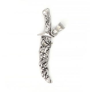 Embossed knife pendant made of stainless steel. Embossed knife pendant made of stainless steel.