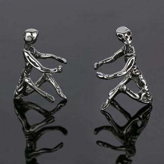 Women's stainless steel non pierced earrings with skeleton design - 