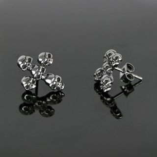Unisex stainless steel stud earrings in cross shape with skulls - 