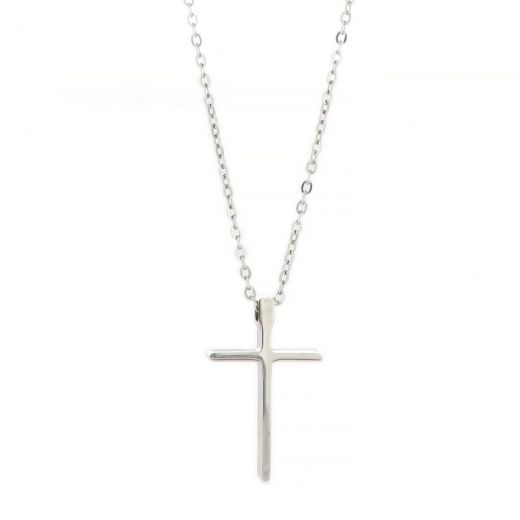 Small cross made of stainless steel in plain line with chain.
