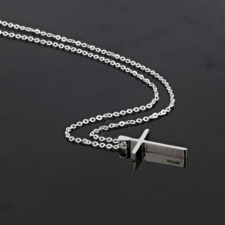 Small cross made of stainless steel in plain line with chain. - 