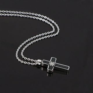 Cross made of stainless steel with black carbon fiber and navy steering wheel with chain. - 