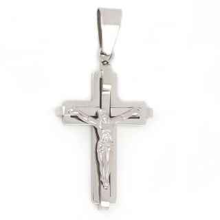 Cross made of stainless steel with the Crucified Christ as embossed design. Cross made of stainless steel with the Crucified Christ as embossed design.
