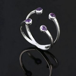925 Sterling Silver ring rhodium plated with four round stones of dark Amethyst - 